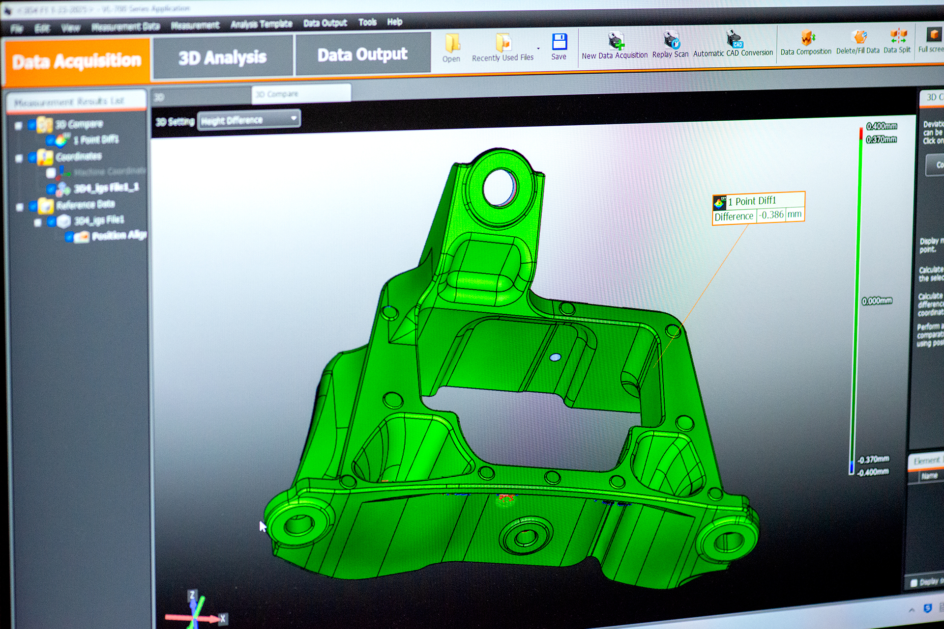 Automotive part shown as a 3D scan on a computer screen for dimensional analysis